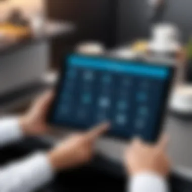 Hotel staff utilizing inventory management software on a tablet